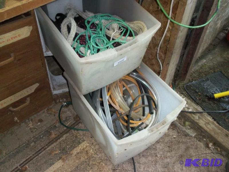 lot 226 image: large white 2 drawer plastic, w hose and rope