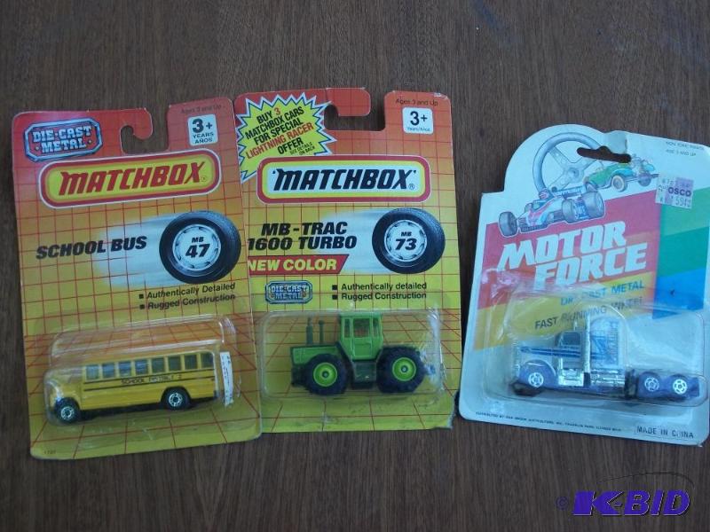 lot 267 image: motor force die-cast metal truck, matchbox school bus, matchbox tractor - all in original packages