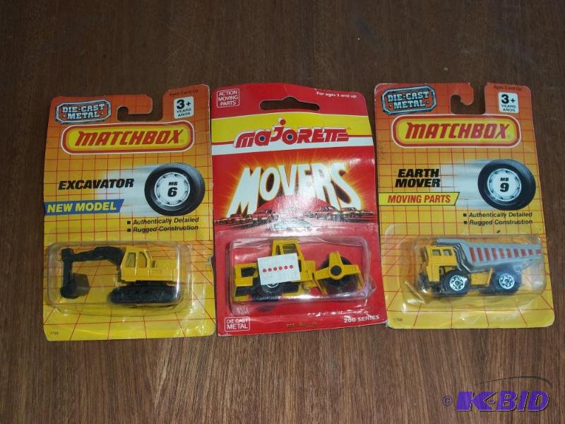 lot 270 image: matchbox earth mover truck, matchbox escavator, majorette roller - all in original packages