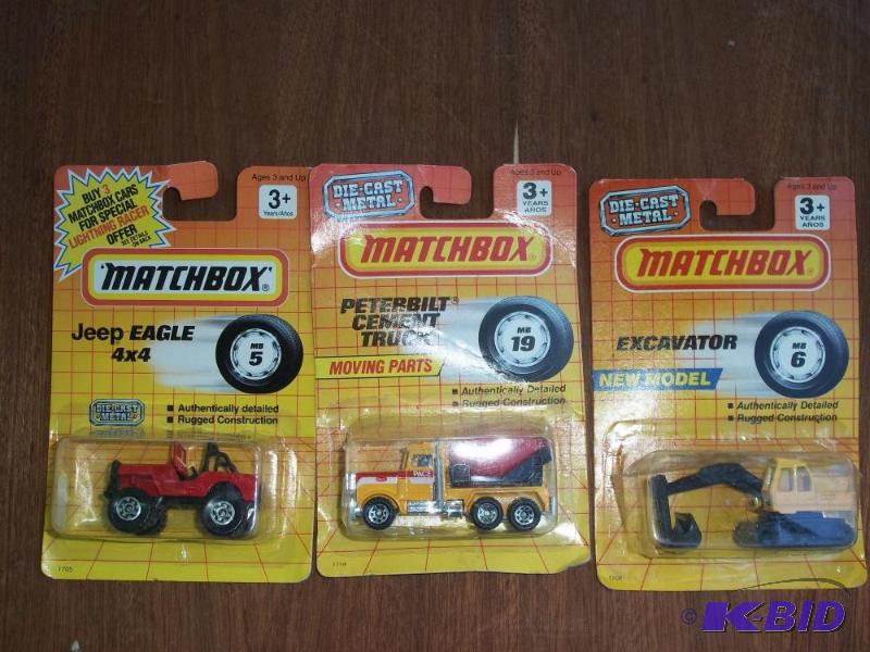 lot 271 image: matchbox escavator, matchbox jeep, matchbox cement truck - all in original packages