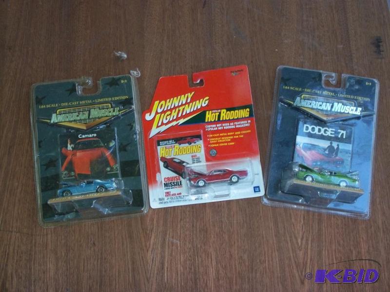 lot 272 image: american muscle dodge charger, camero, johnny lightning cutlass, all in original packages