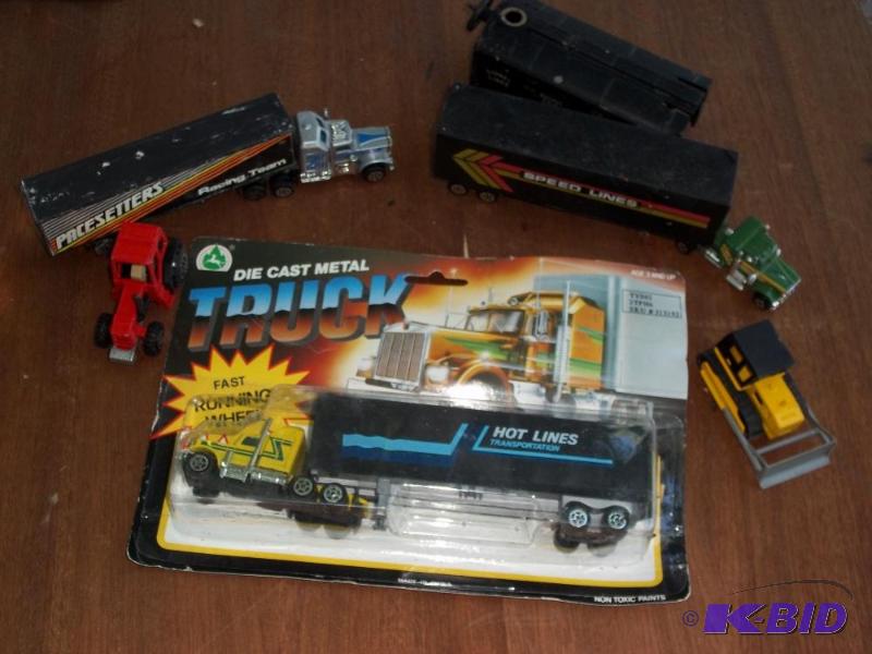 lot 275 image: pace setters truck, speedlines truck, tractor, bulldozer, hotlines truck in packaging