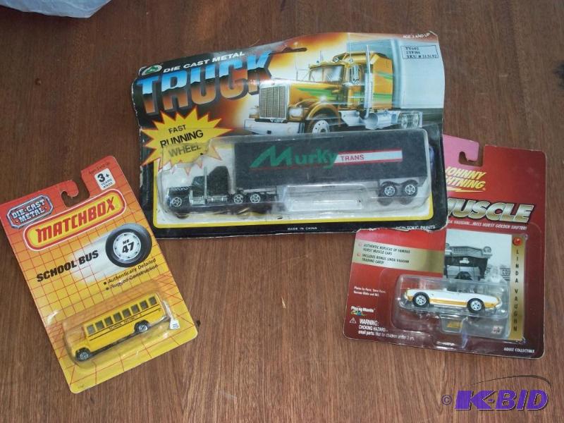lot 276 image: matchbox bus, murky truck, johnny lightning oldsmobile - in original packaging