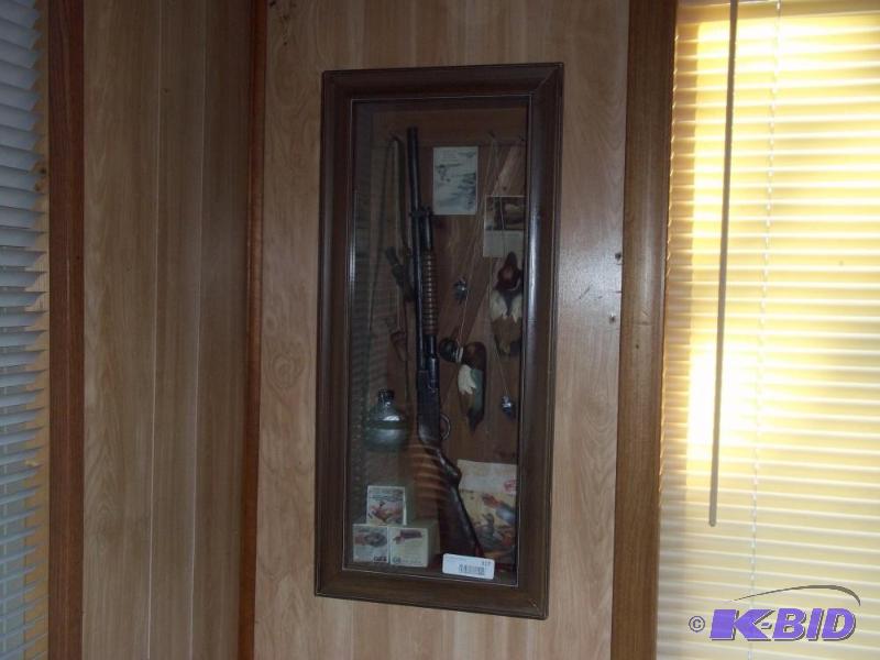 lot 317 image: Shadow box with shotgun and duck decoys