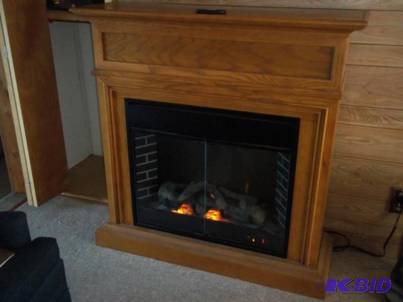 lot 323 image: electric fire place heater with remote