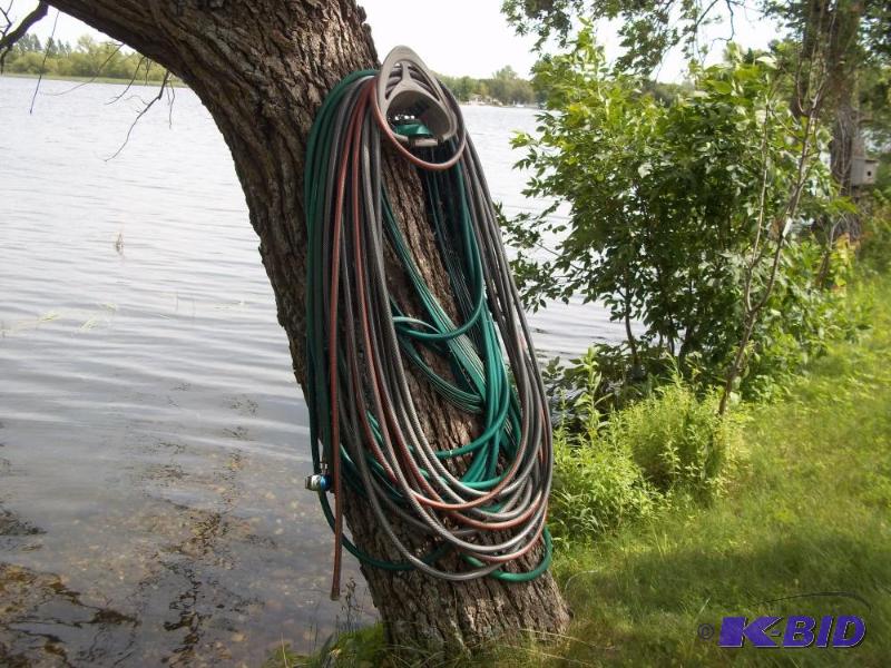 lot 355 image: Water hose and sprinklers