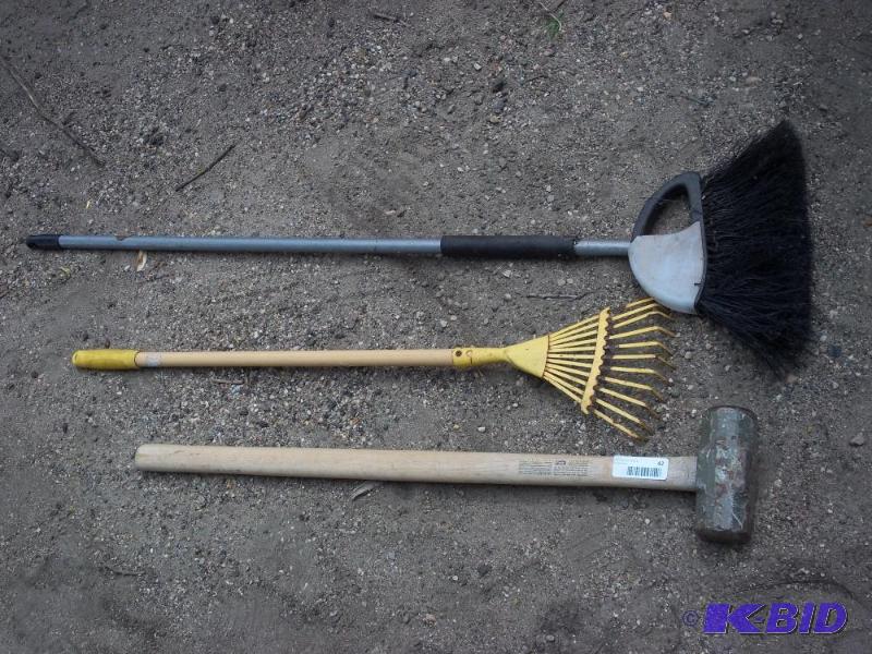 lot 42 image: Broom, rake, sledge hammer