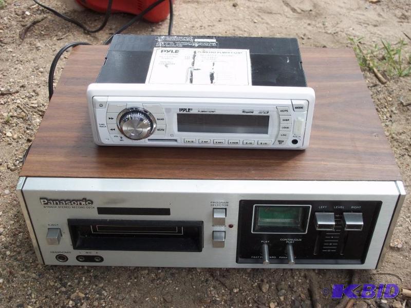 lot 54 image: Car radio with Panasonic 8 track Deck