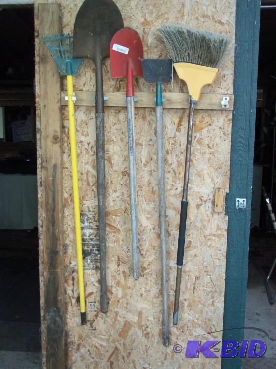 lot 73 image: two shovels, rake, scrapper, broom,