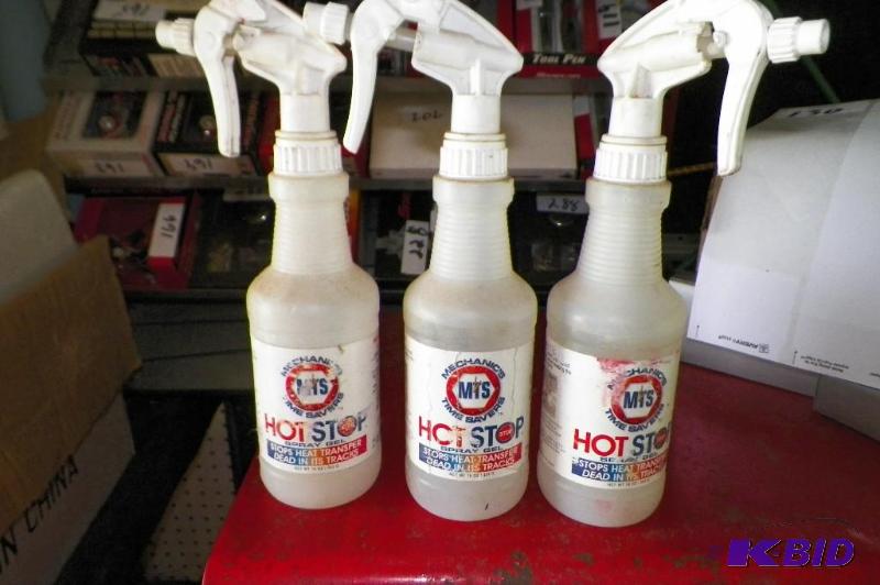 lot 1032 image: 3 Partial Bottles Mechanics Hot Stop.