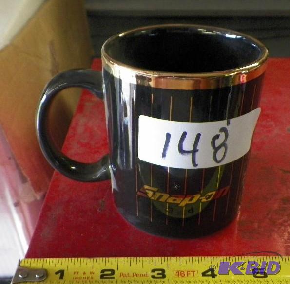lot 148 image: Snap-on Black & Gold Coffee Mug