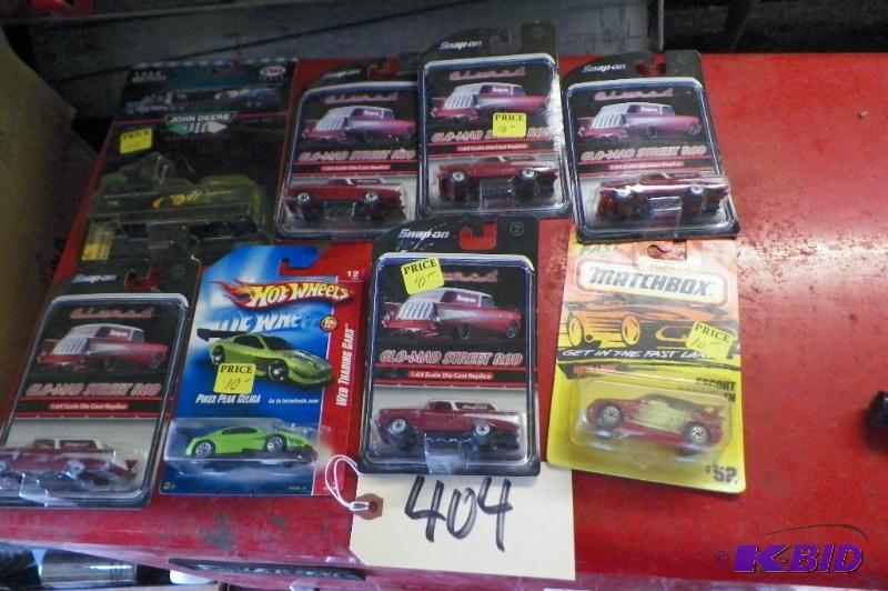 lot 404 image: Lot of 8 Cars Including Hot Wheels & Glo-Mad Some Cars Are Faded