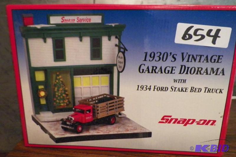lot 654 image: Snap-on 1934 Vintage Garage Diorama with 1934 Ford Stake Bed Truck