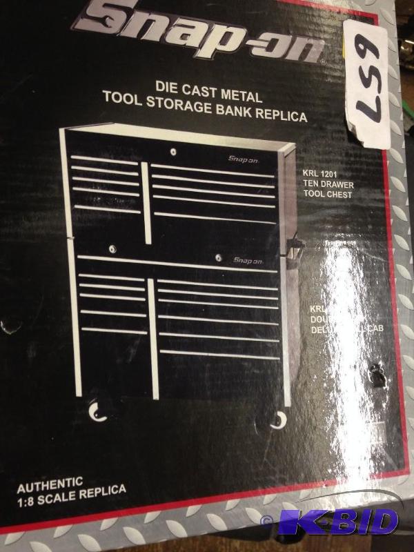 lot 657 image: Snap-on Die cast Black Metal Storage Bank Replica