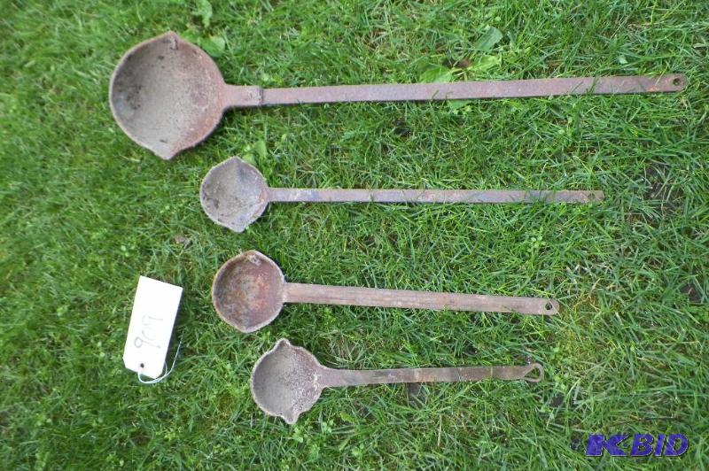 lot 909 image: 4 Antique Lead Pouring Ladles. Longest is 26. Shortest is 13.