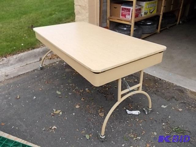 lot 2 image: Folding Table With 3-Wheels (Needs A Bolt On ...