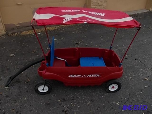 lot 8 image: Radio Flyer 2-Seat Wagon With Canopy...