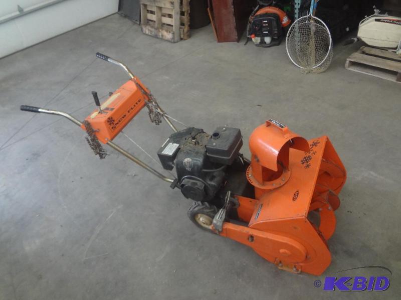 lot 21 image: MTD Snow Flite Snow Blower, Tire Chains Inclu...