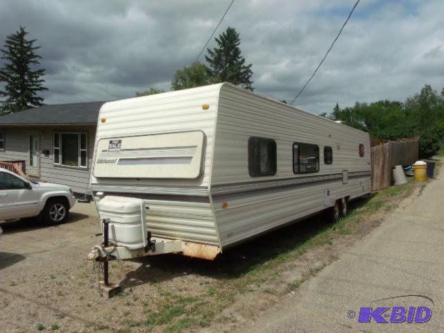 lot 1 image: 1991 Wildwood 36 Travel Trailer by Rockwood