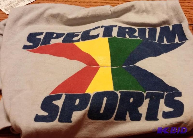 Never worn Spectrum Sports size L youth t-shi...