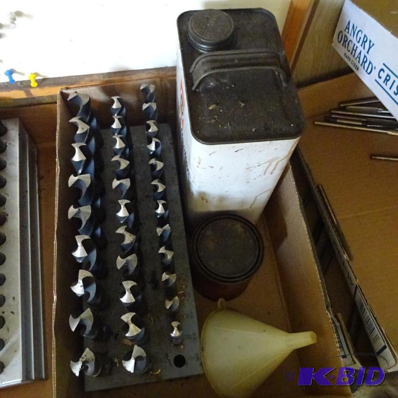 lot 129 image: 3364- 1" Drill bit set. Grinding oil...