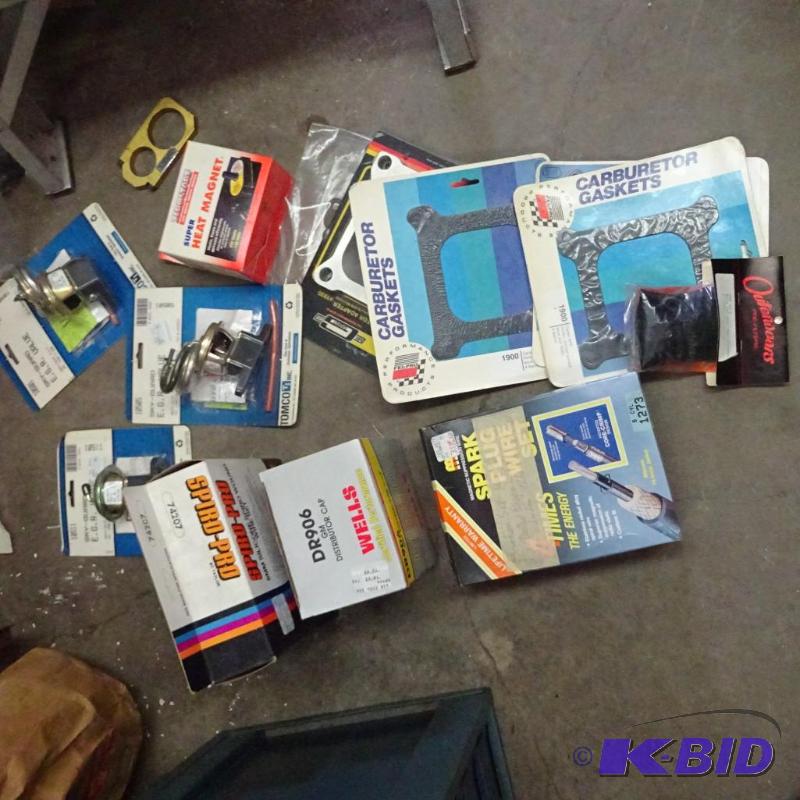 lot 223 image: Carburetor gaskets, spark plug wires, Heat ma...
