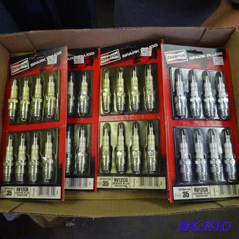 lot 232 image: Champion spark plugs...
