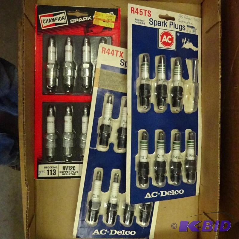 lot 235 image: AC Delco spark plugs, Champion...