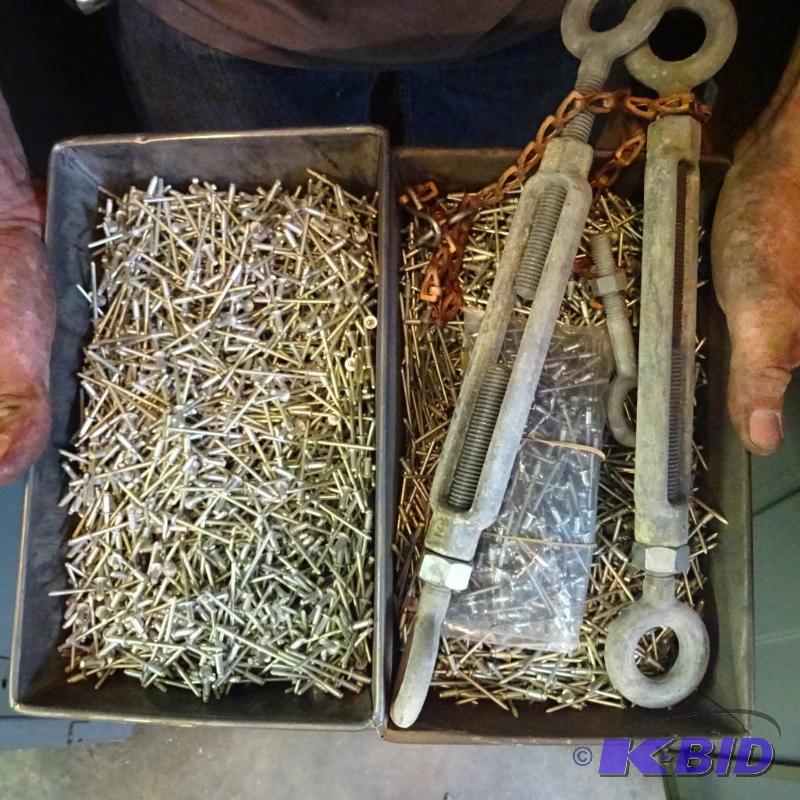 lot 414 image: 2 pans of rivets...