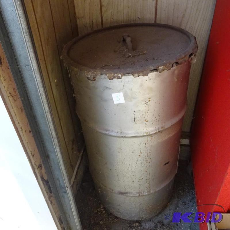lot 5 image: 15 Gallon can of oil dry. About 34 full...
