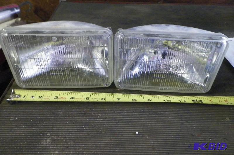 lot 2031 image: Two 6 12 Wagner Halogen Headlights