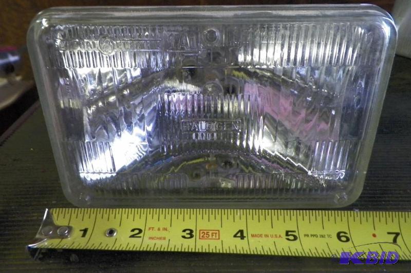 lot 2032 image: 6 12 GE Halogen Headlight