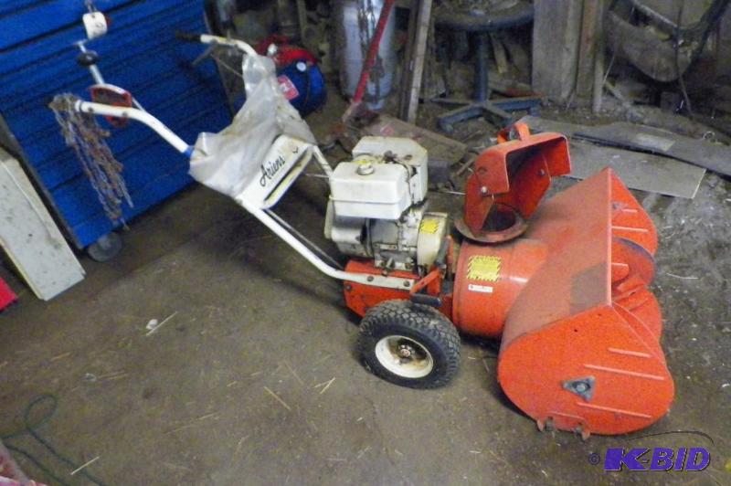 lot 2037 image: Ahrens 5 HP Snowblower 24 inches wide