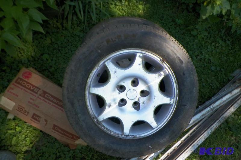 lot 2104 image: Set of 2 225 60 R16 Tires with Rims