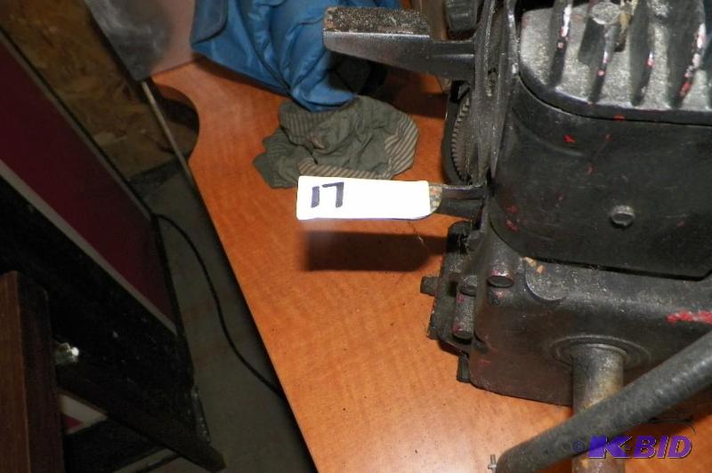 lot 17 image: Pull Start Lawn Mower Motor Came From Storage Unit Seems To Have Compression As Is
