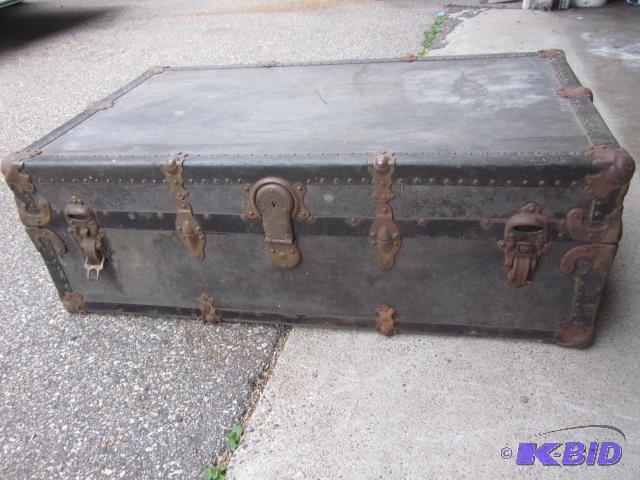 lot 124 image: Antique trunk with decorative cast moldings a...