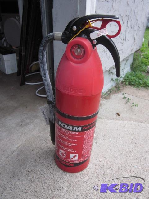 lot 131 image: Fully charged fire extinguisher. ...