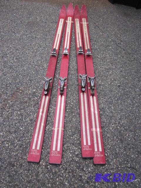 lot 134 image: (2) pair of vintage downhill skis, wall hange...