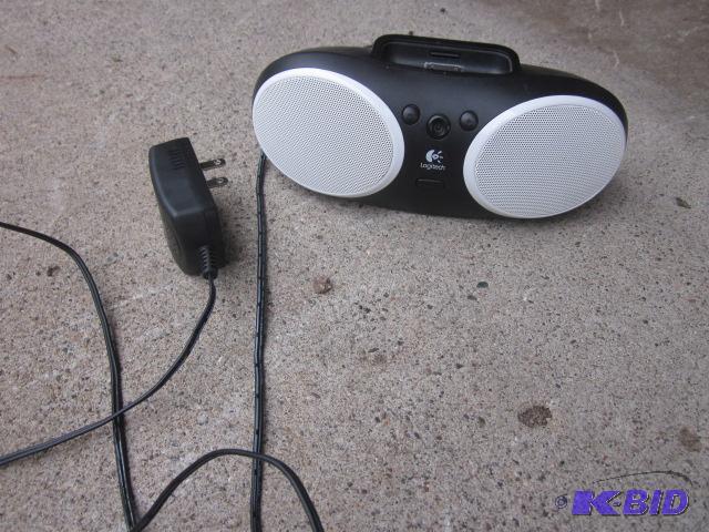 lot 139 image: Logitech docking station with speakers to pla...