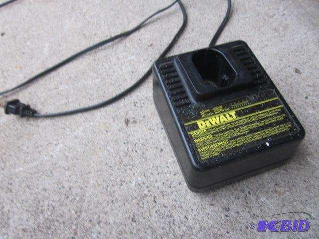 lot 141 image: Dewalt 9104 battery charger....