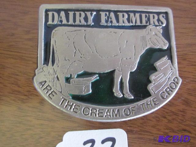 lot 22 image: Dairy Farmers metal and enamel belt buckle.&n...