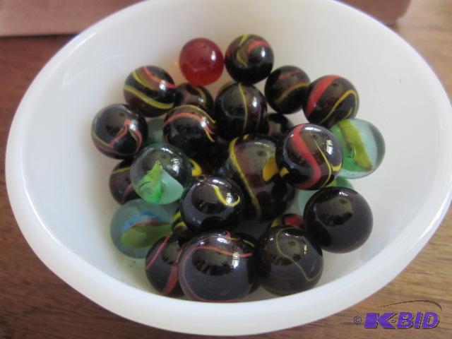 lot 25 image: Lot of vintage marbles in milk glass bowl....