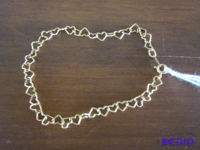 lot 4 image: 1.6 gram 14 karat gold heart bracelet, marked...