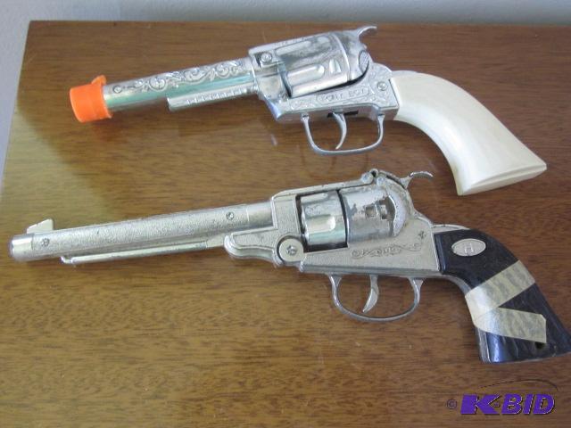 lot 42 image: Pair of vintage toy cap guns, (1) is Hubley a...