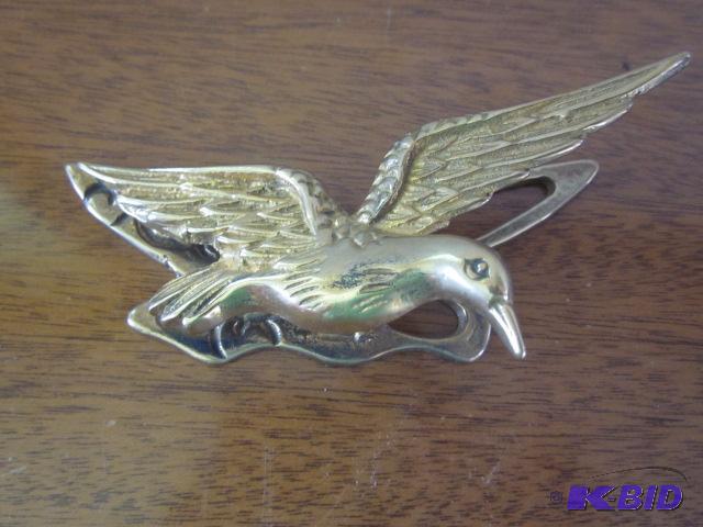 lot 46 image: Vintage brass eagle paper clip....