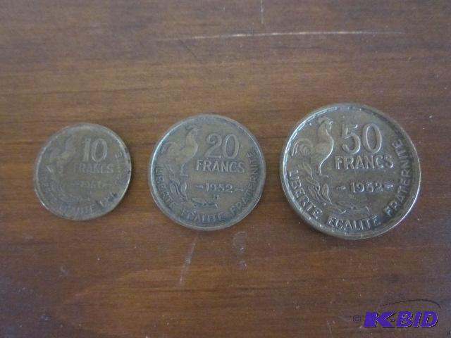 lot 5 image: Lot of (3) foreign coins, 10, 20, and 50 Fran...