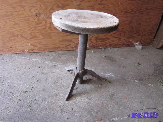 lot 64 image: Small antique wood and metal milking stool.&n...