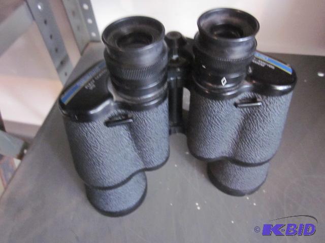 lot 99 image: Pair of Tasco Fully Coated 312 10x50 Binocula...