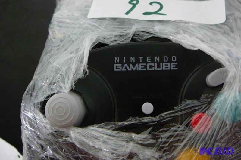 Nintendo game cube with controllers, cables a...