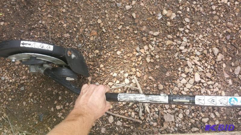 lot 115 image: Weed trimmer attachment.  Edger for expand-it compatible weed whackers. good shape